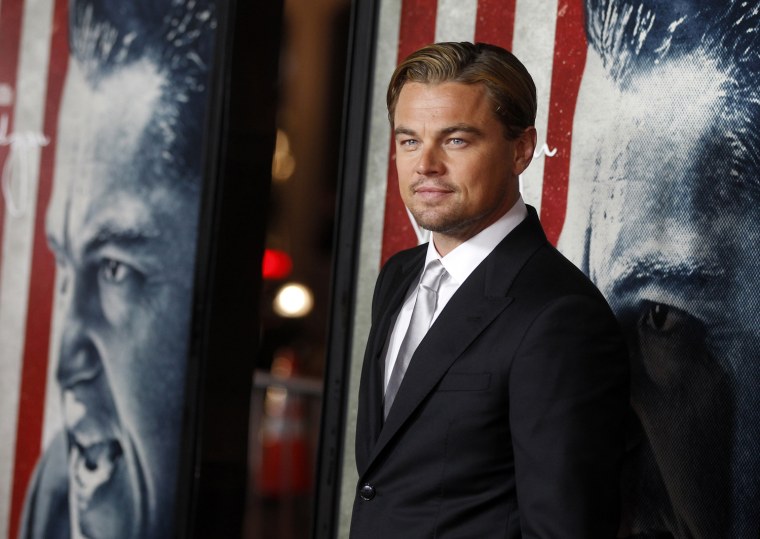 Image: Actor Leonardo DiCaprio poses at the opening night gala for AFI Fest 2011 in Hollywood